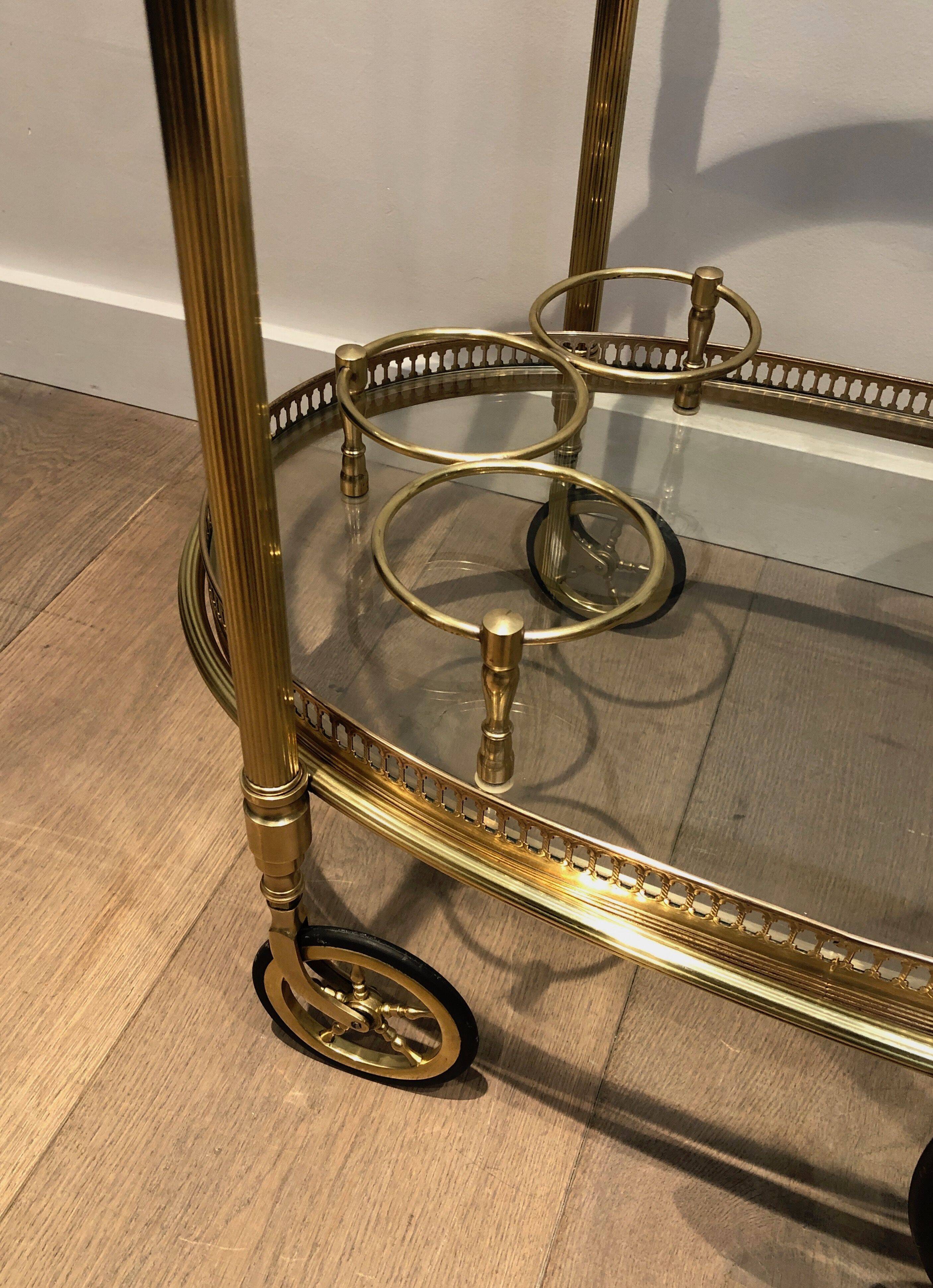 Oval brass trolley from Maison Baguès.