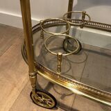 Oval brass trolley from Maison Baguès.