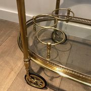 Oval brass trolley from Maison Baguès.