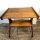 Table d'appoint sculpturale sur roulettes, bois massif, années 1950