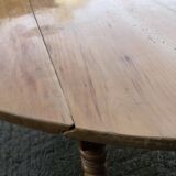 Round table in solid cherry wood, extendable with twisted legs, Louis Philippe style.