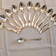 Silver cutlery set for 36 place settings and its ladle.