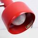 Red metal articulated desk lamp