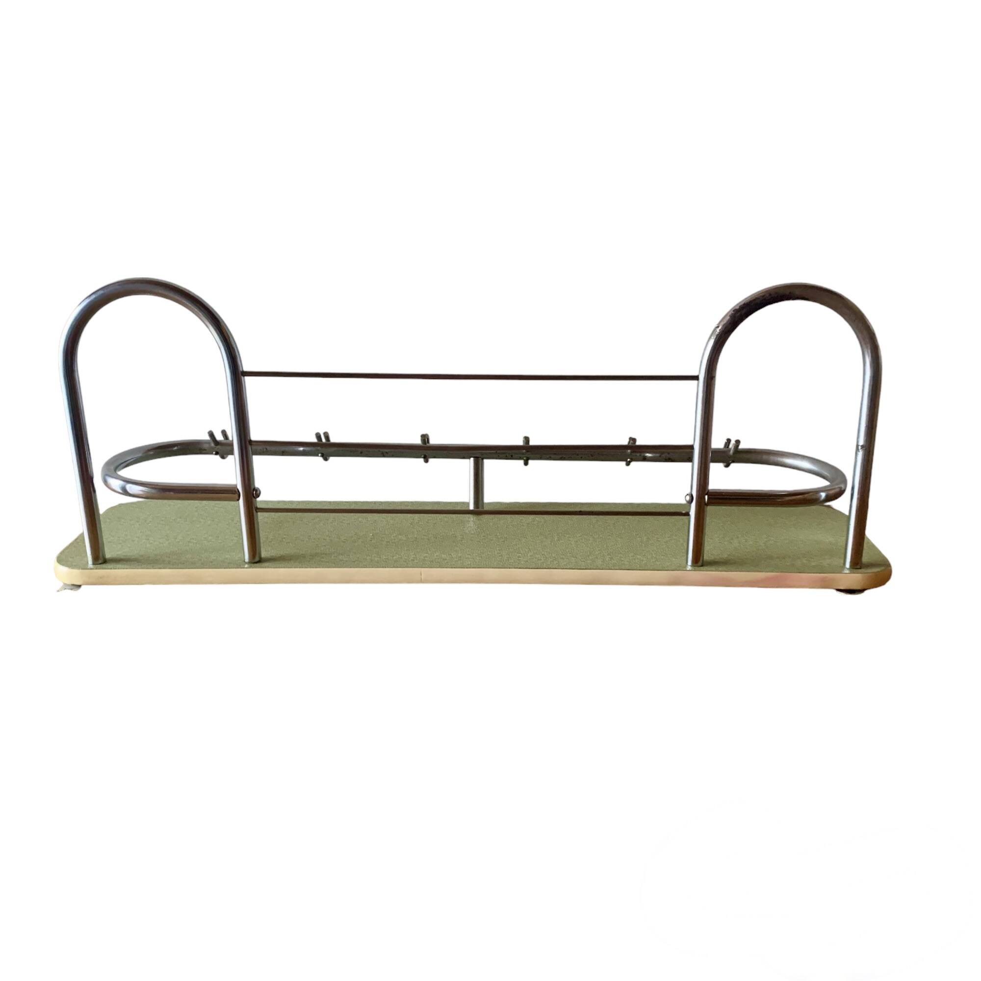 Large vintage wall-mounted coat rack in green Formica and chrome metal