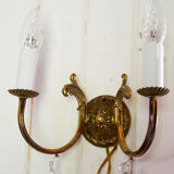 Old brass wall lamp with grapevines