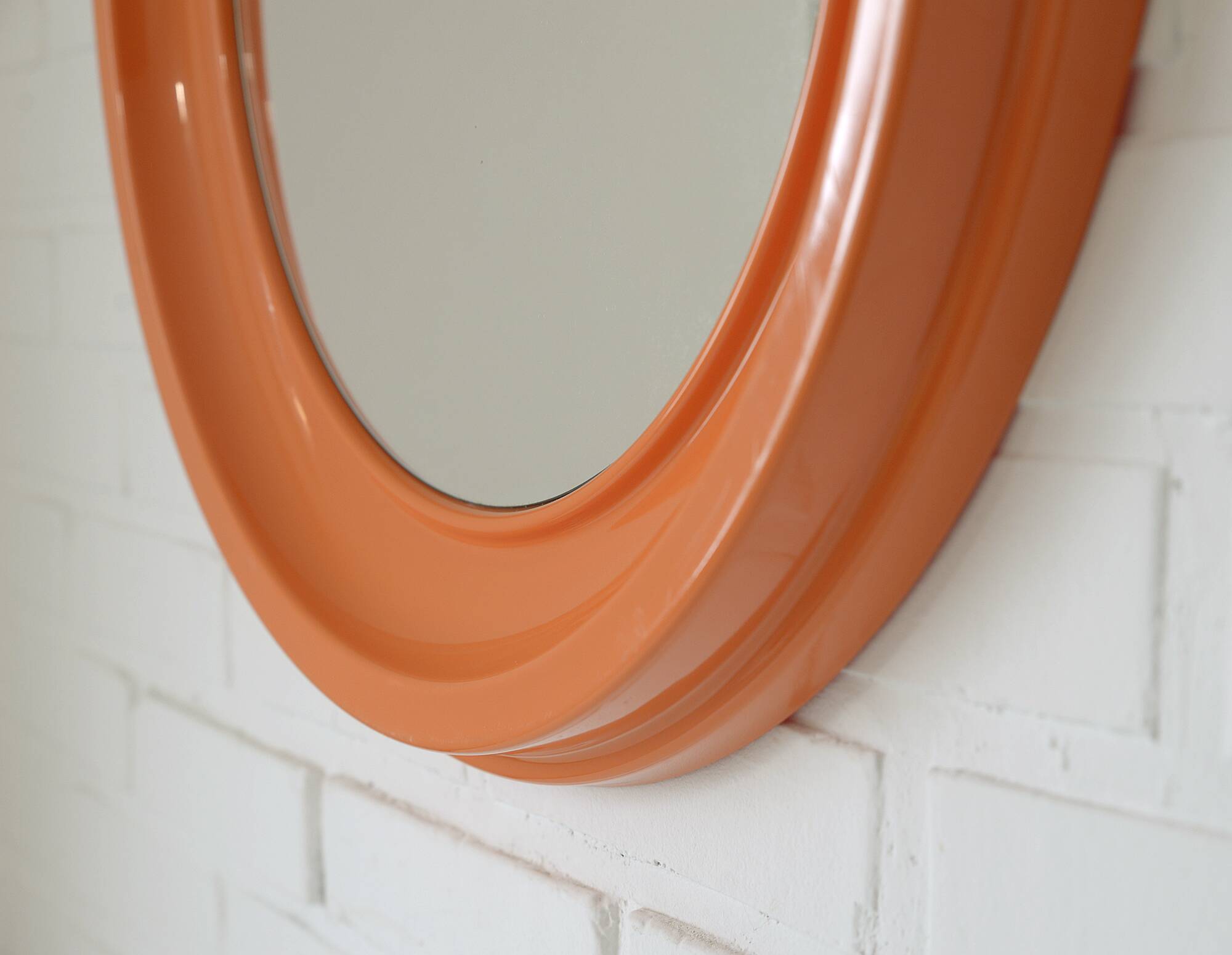 Orange vintage round wall plastic mirror 1980s, space age vanity mirror