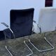Paire de fauteuils en acier tubulaire