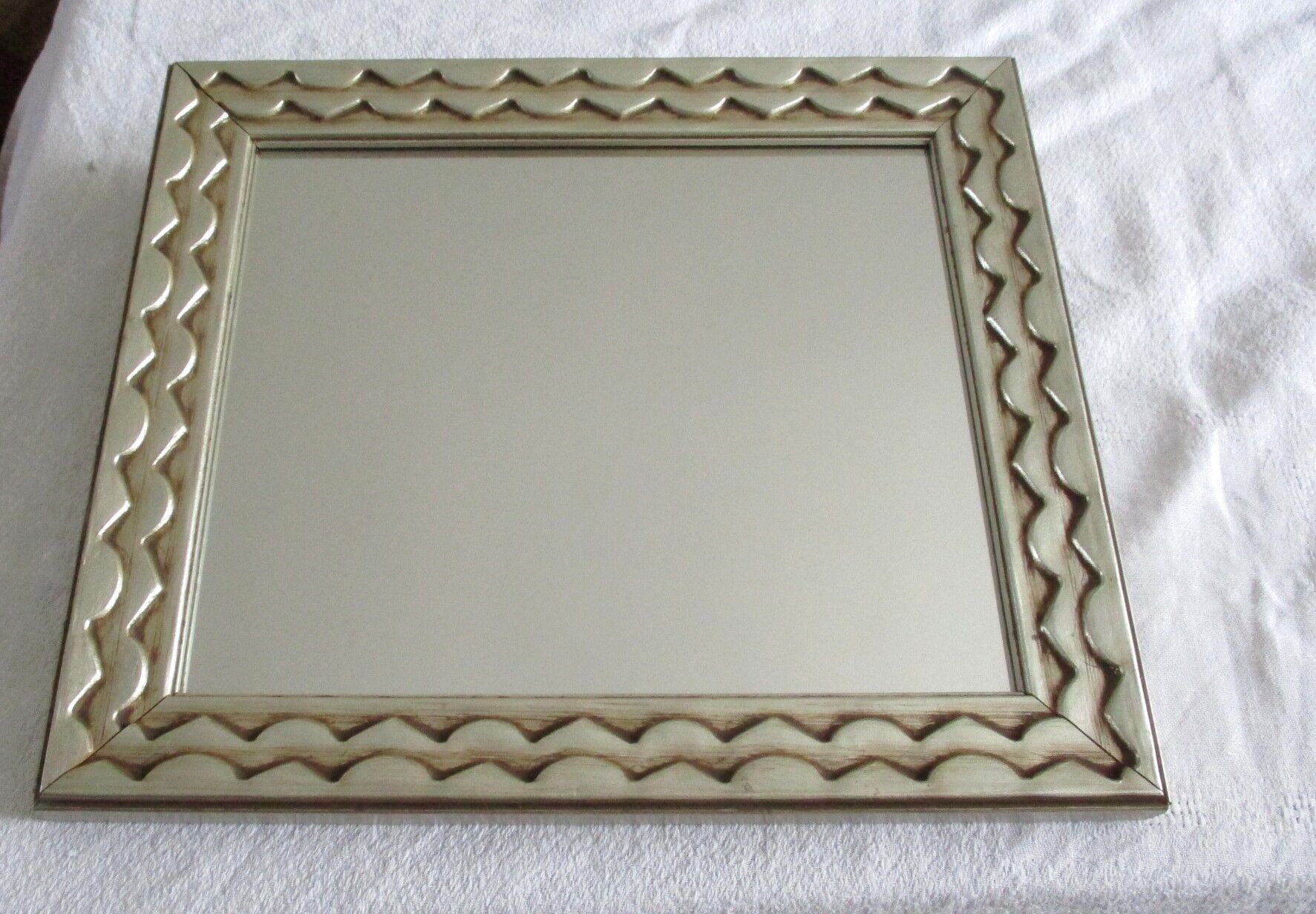 Mirror framing silver carved wood