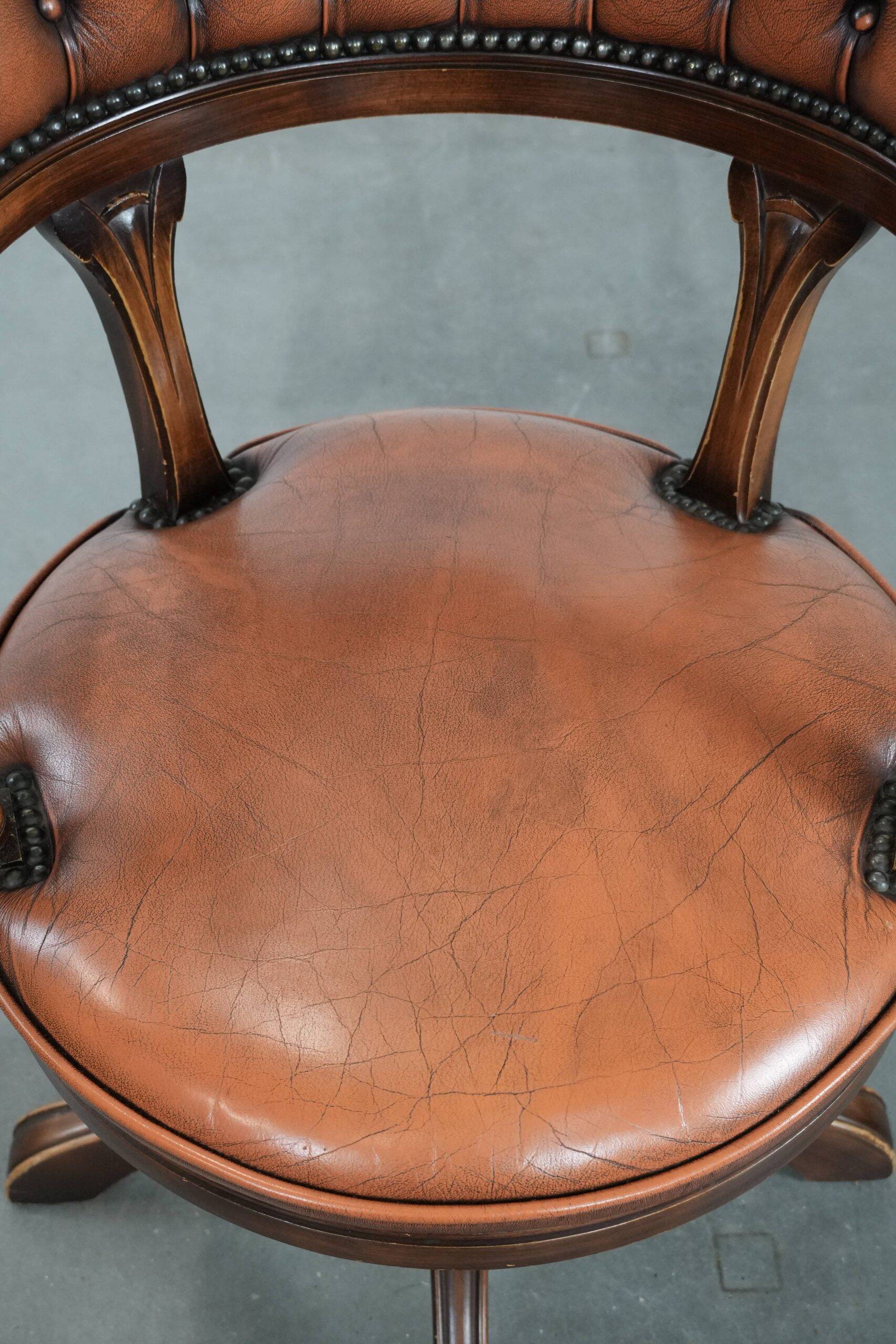 Classic and timeless cow leather and wooden Chesterfield office chair