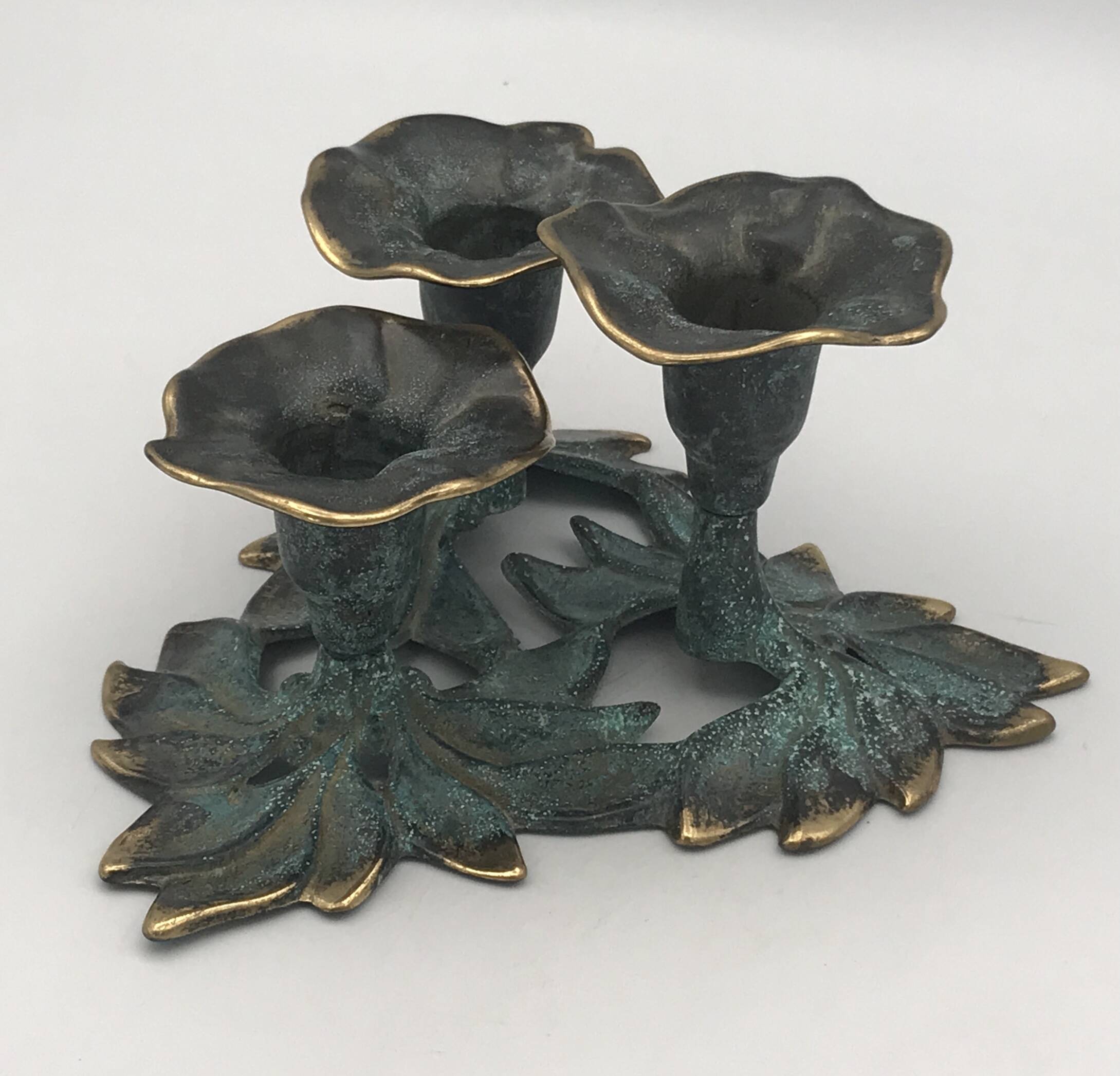3-flower brass candlestick with green patina
