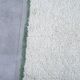 Handmade natural wool rug in green and white, 150x250 cm.
