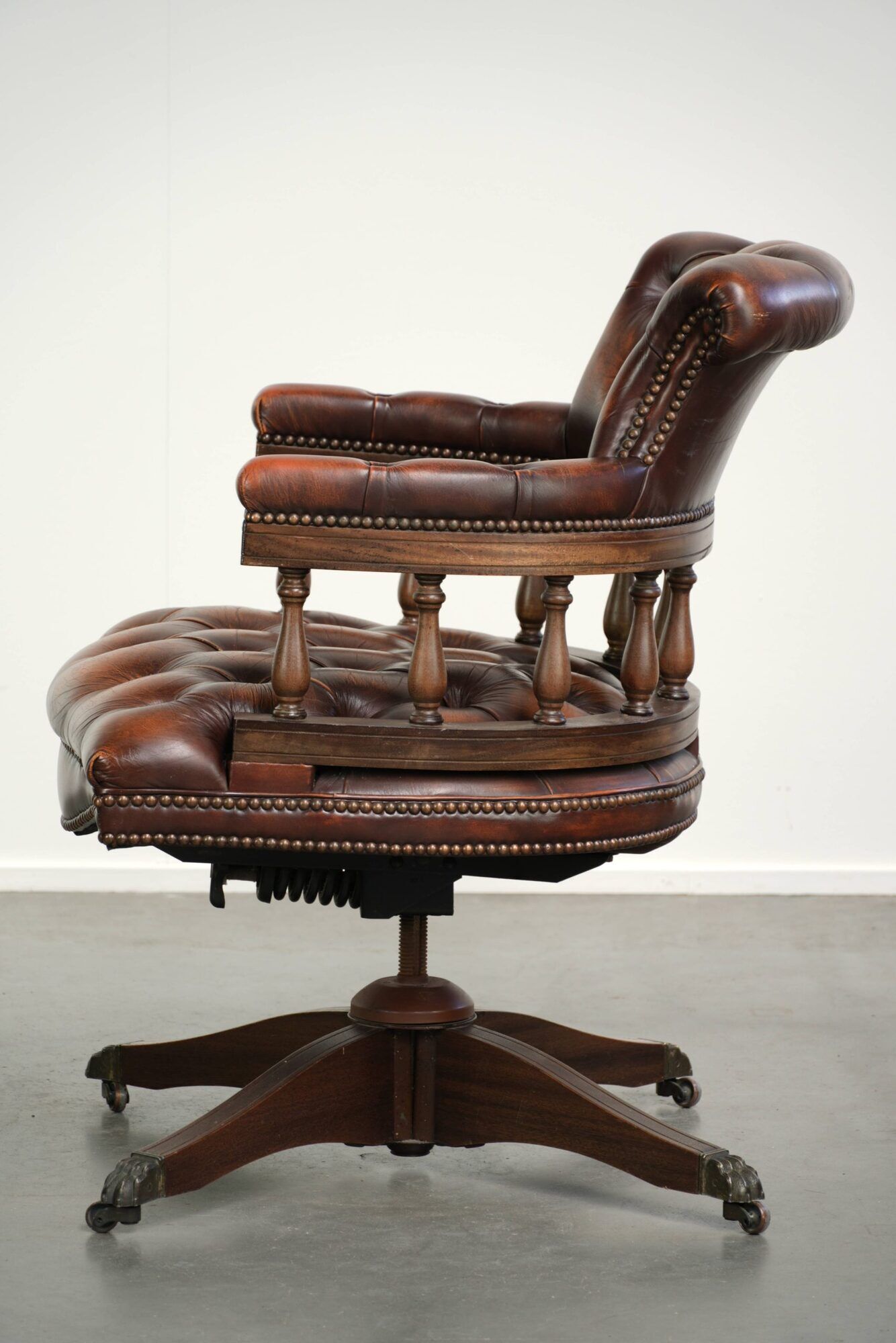 English cowhide Chesterfield swivel and tilt button seat office chair