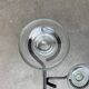 Mid-century metal and glass pendant light from the 1960s.