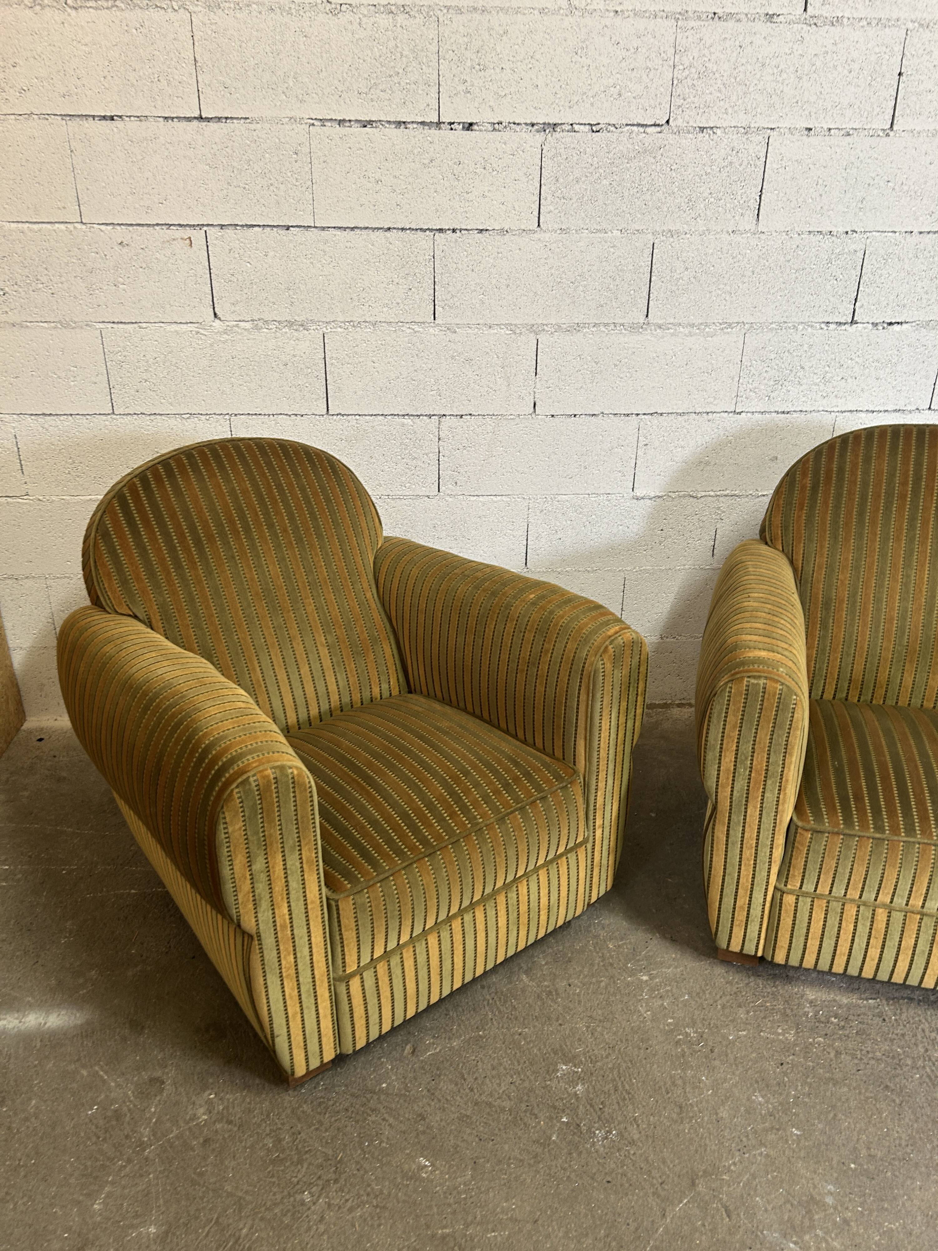Pair of green fabric armchairs