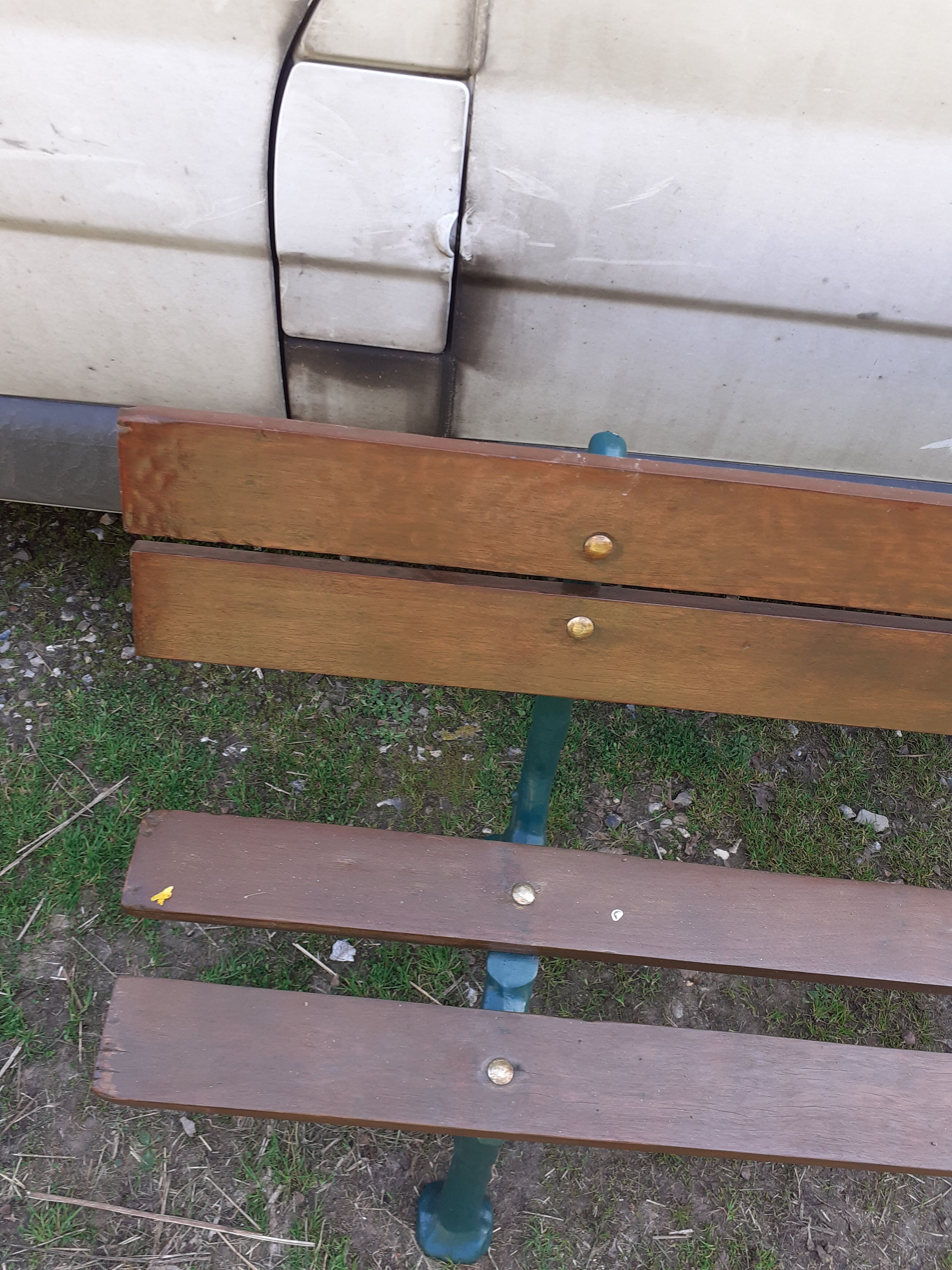 Old garden bench with cast iron feet