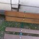 Old garden bench with cast iron feet