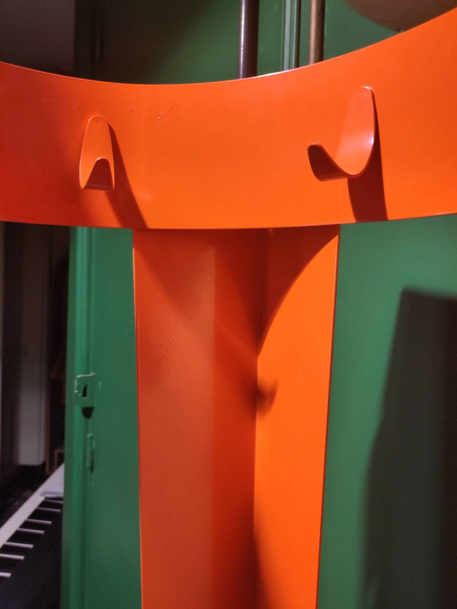Orange designer coat rack 'Chase G' by Van Esch from the 2000s.