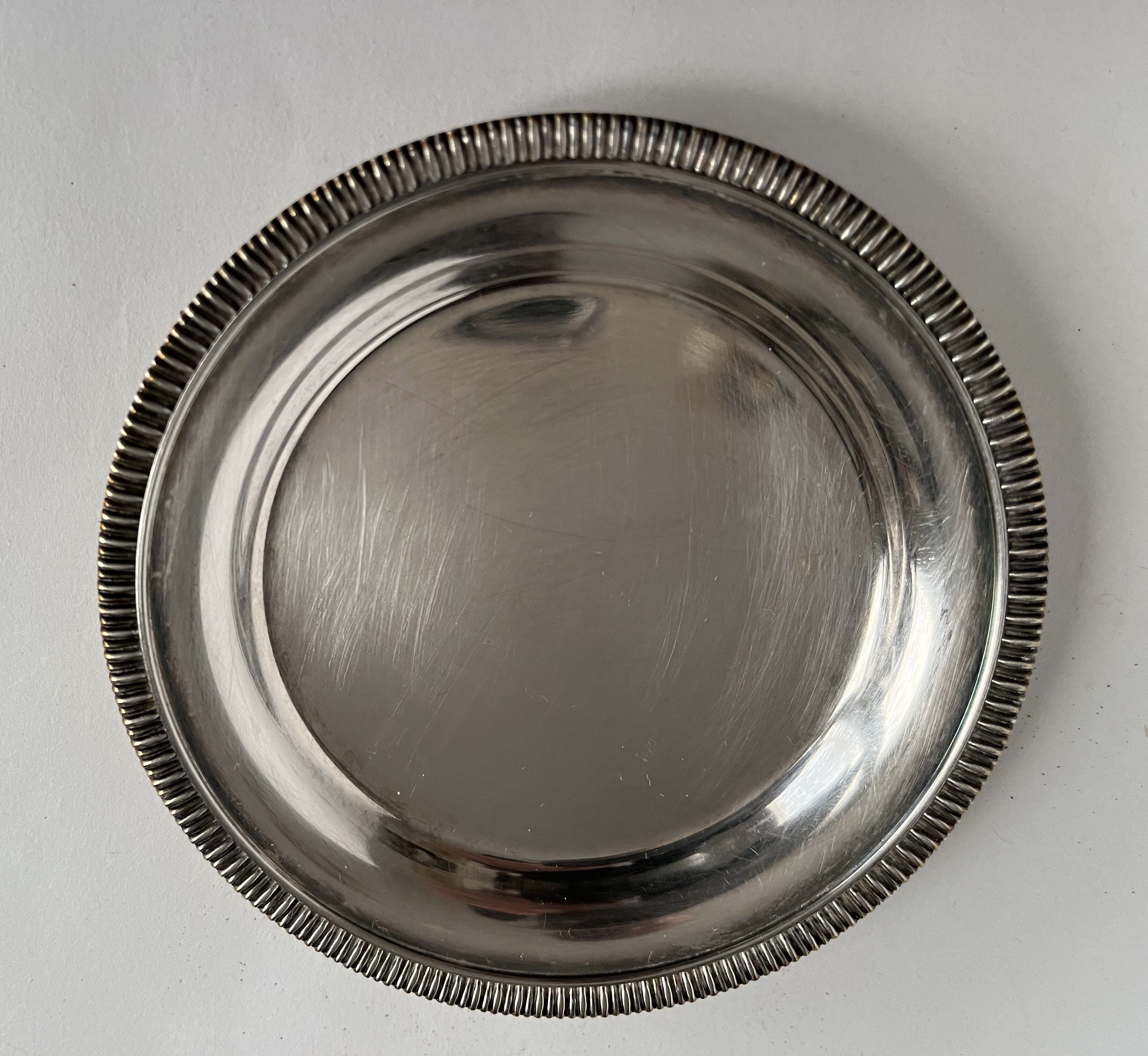 Set of 5 silvered metal coasters