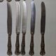 Lot de 11 couteaux pied en argent lame en métal inoxydable coquillage