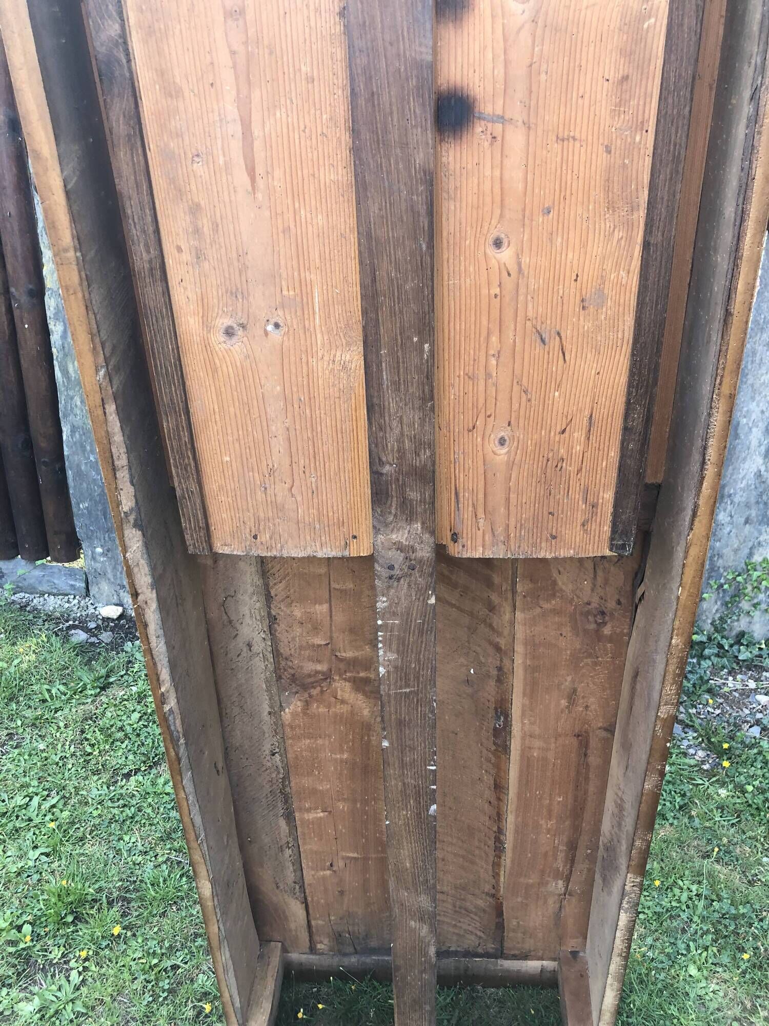 Antique farmhouse table in solid cherry wood with 2 drawers and 1 pull-out at the end with turned legs.