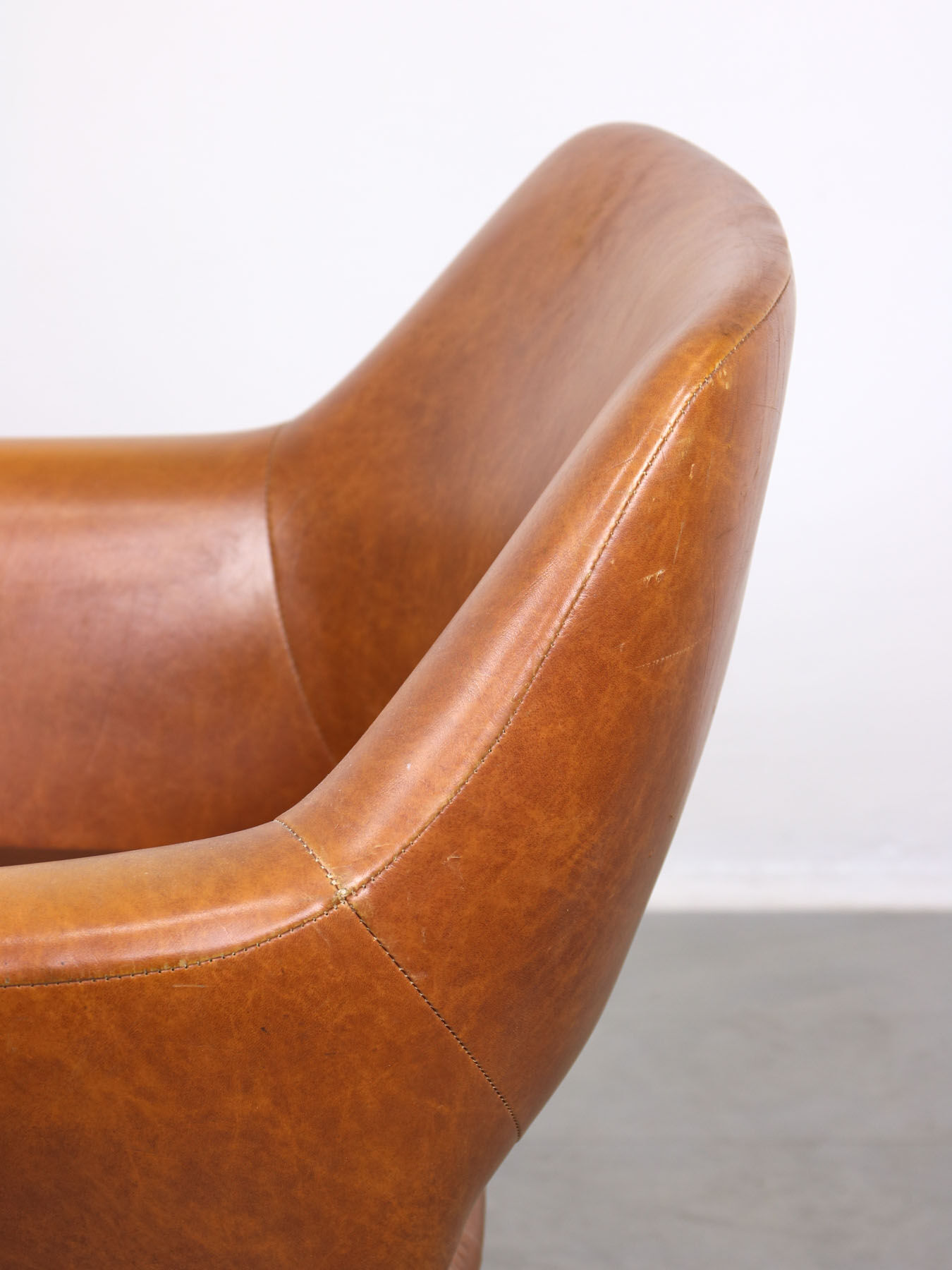 Mid-century brown leatherette swivel chair from Stol