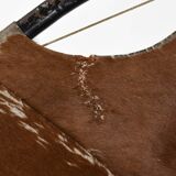Cowhide armchair, circa 1960