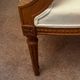 Pair of Louis XVI style medallion armchairs, late 19th / early 20th century.
