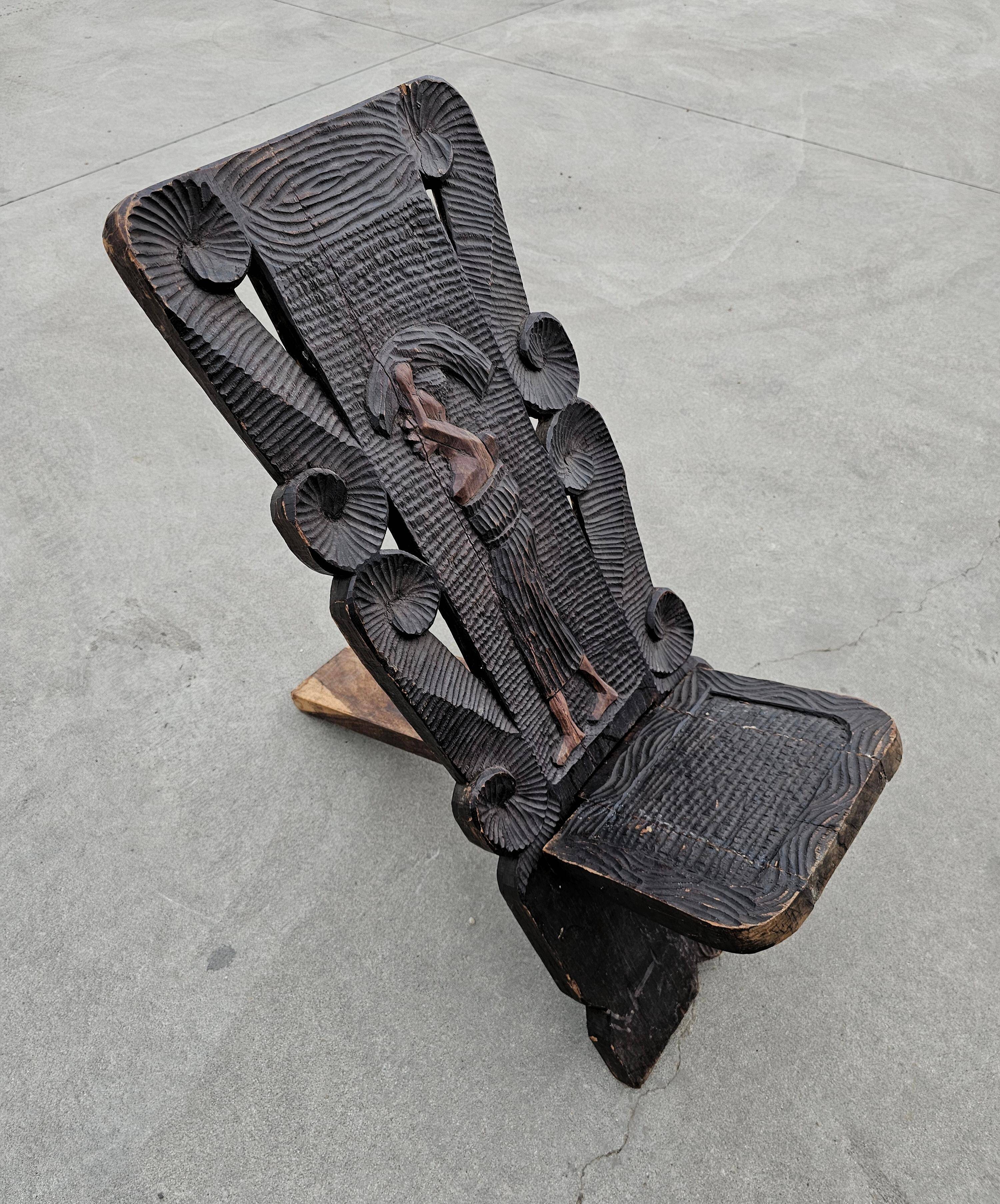 Antique carved wood Stargazer chair from the 1890s.