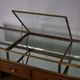 Counter or shop window in oak glass and brass France around 1920