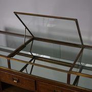 Counter or shop window in oak glass and brass France around 1920