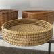 Trio of vintage wicker and woven raffia baskets