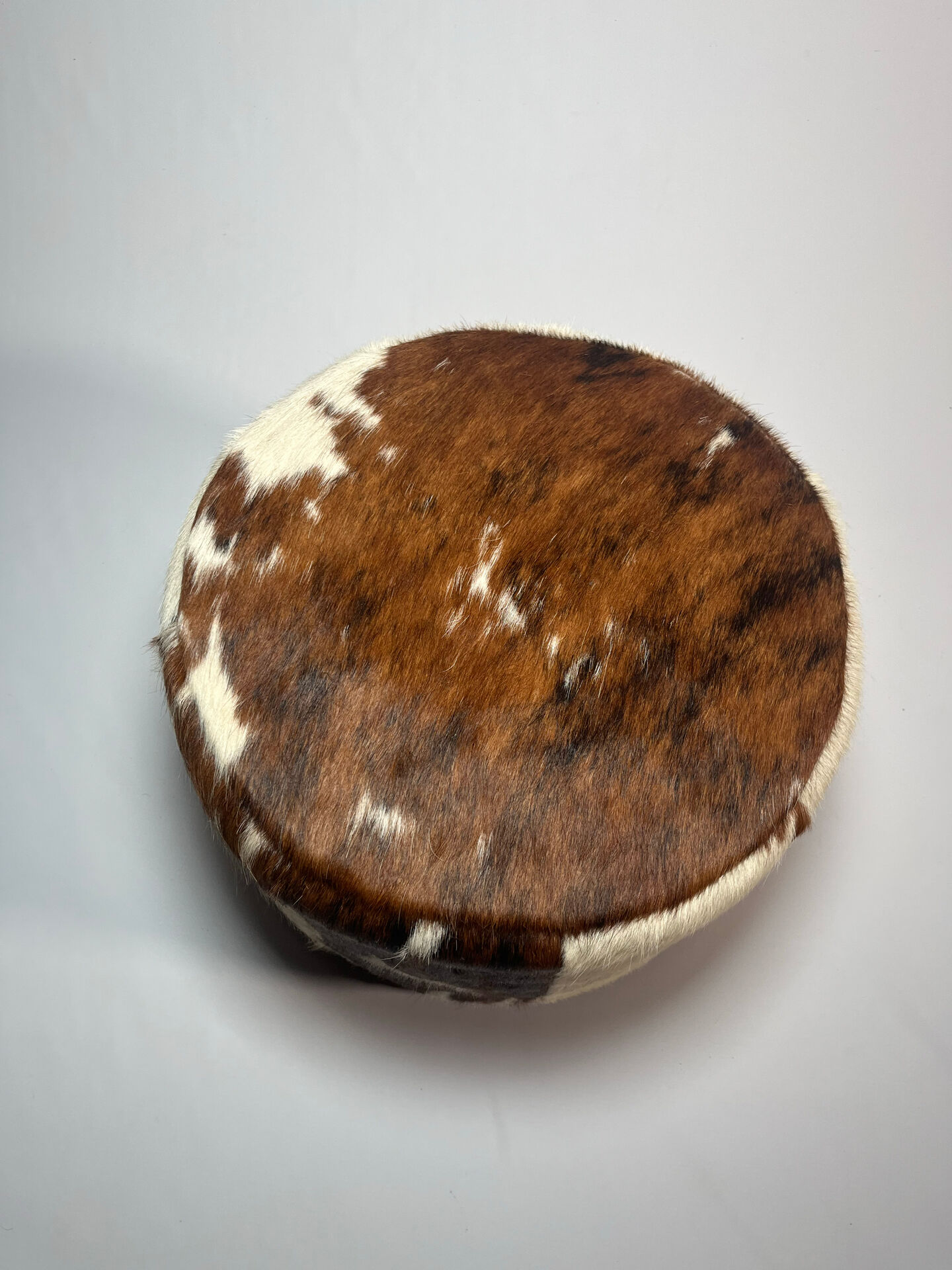 Vintage cowhide pouf from the 80s.