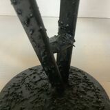 Pair of black metal candlesticks