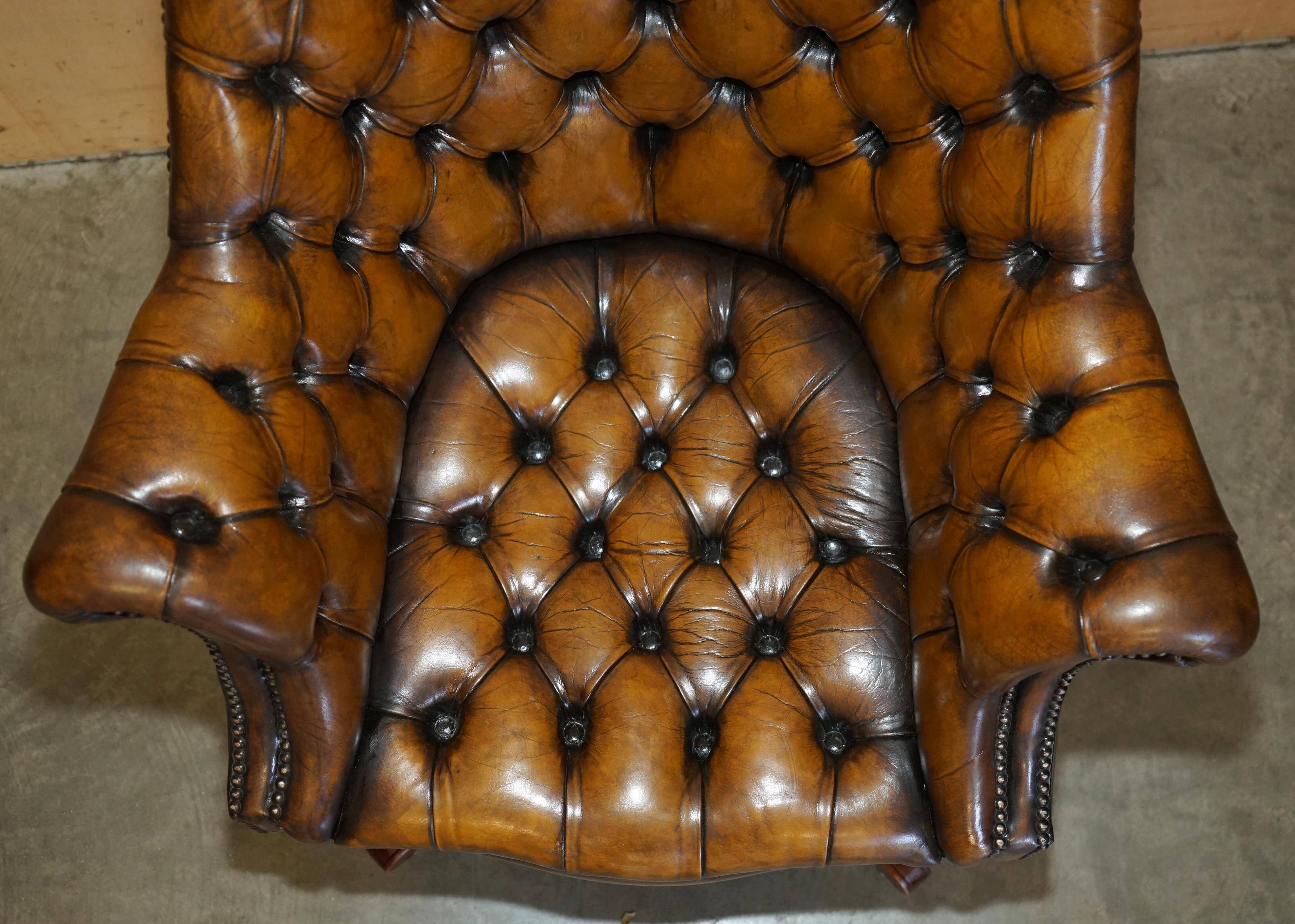 Fauteuil Chesterfield directeur ou capitaine Art Déco en cuir restauré