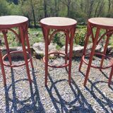 3 wooden and cane bar stools