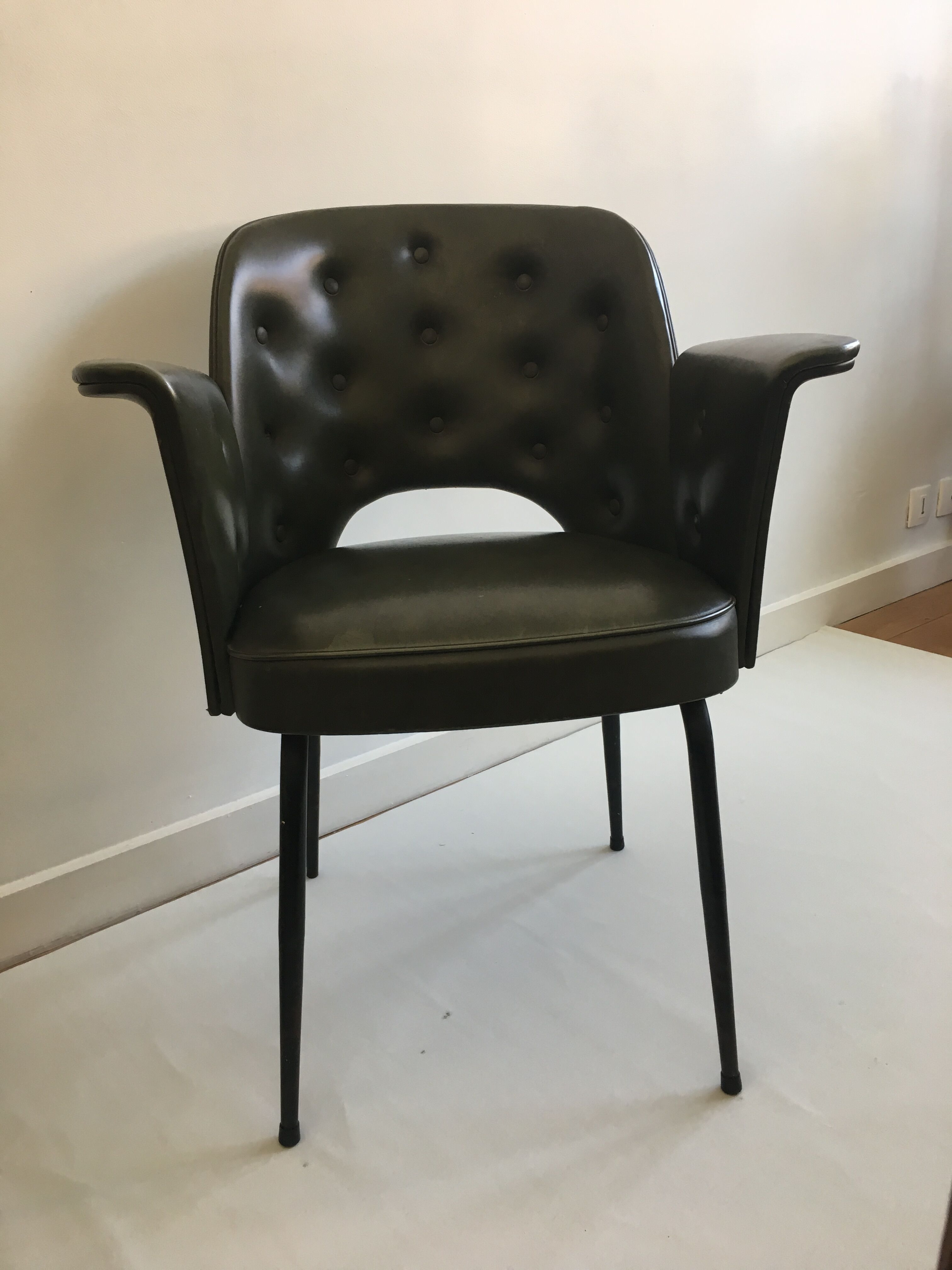 Chair in bottle green leatherette