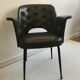 Fauteuil en skaï vert bouteille