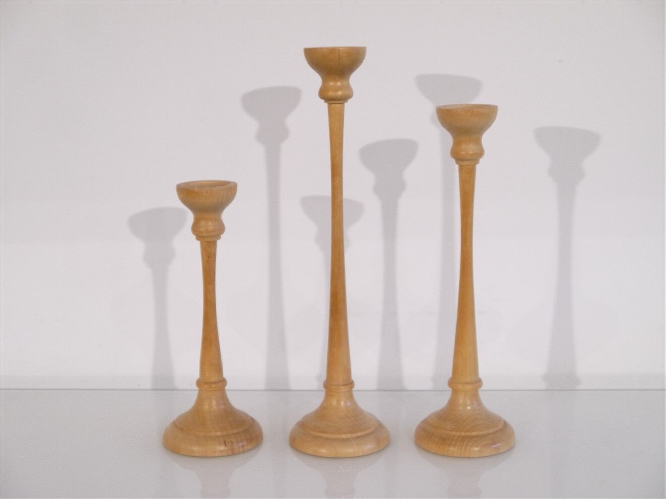 Set of Scandinavian wooden candle holders 1960
