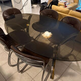 Table and chairs in the style of Gastone Rinaldi.