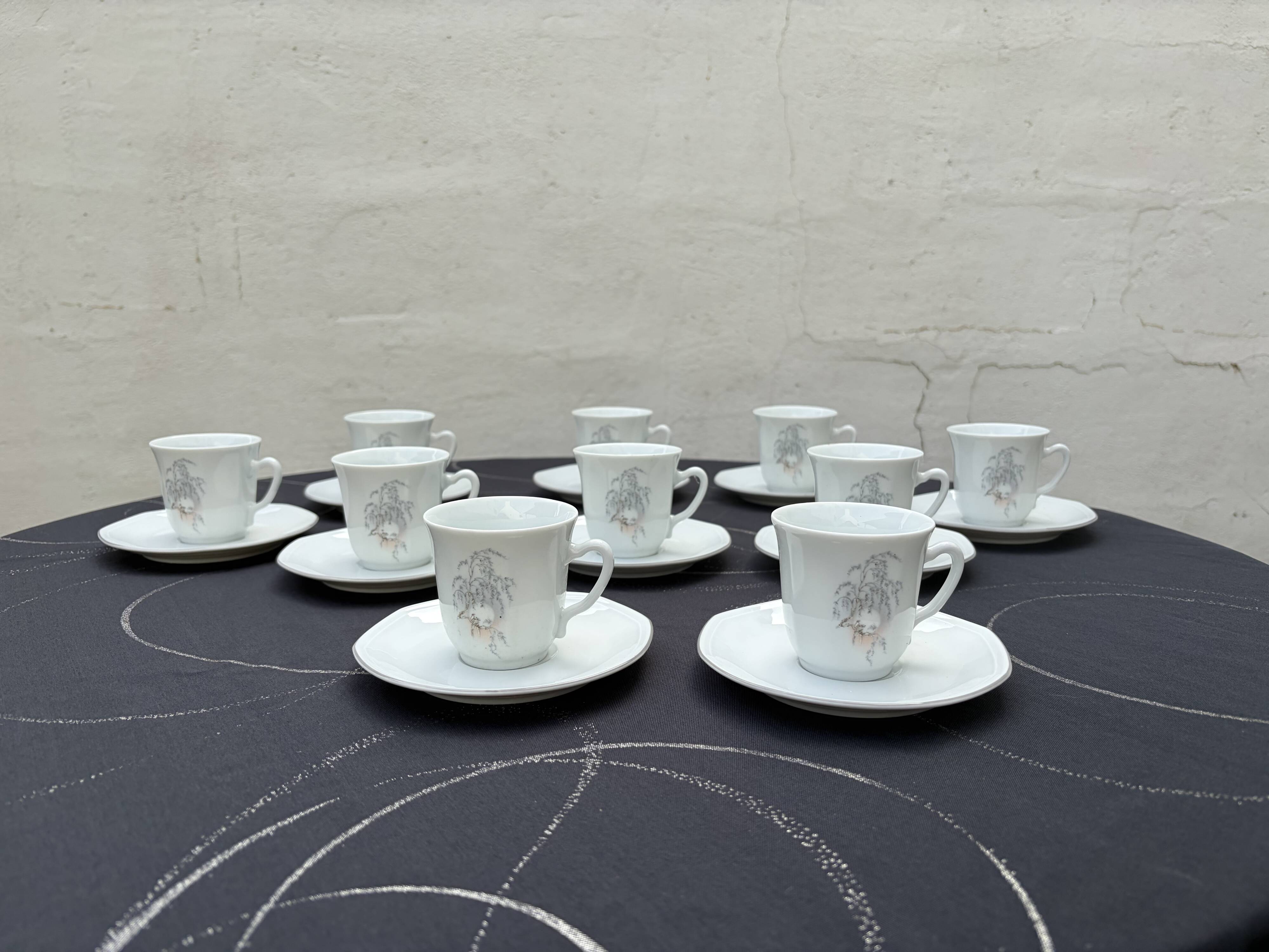 Set of 10 cups and 10 saucers porcelain from Sologne.