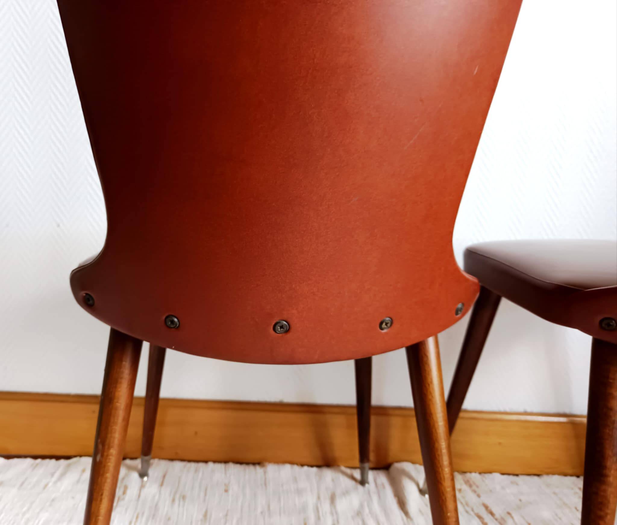 Pair of vintage vinyl chairs with splayed legs