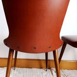 Pair of vintage vinyl chairs with splayed legs