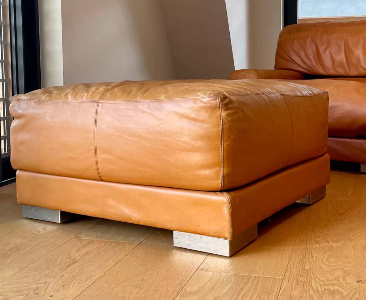 Pair of vintage armchairs Gérard Guermonprez tawny leather and stainless steel, France 1970