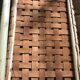 Woven leather bench