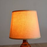 Vintage table lamp in turned wood and fabric lampshade