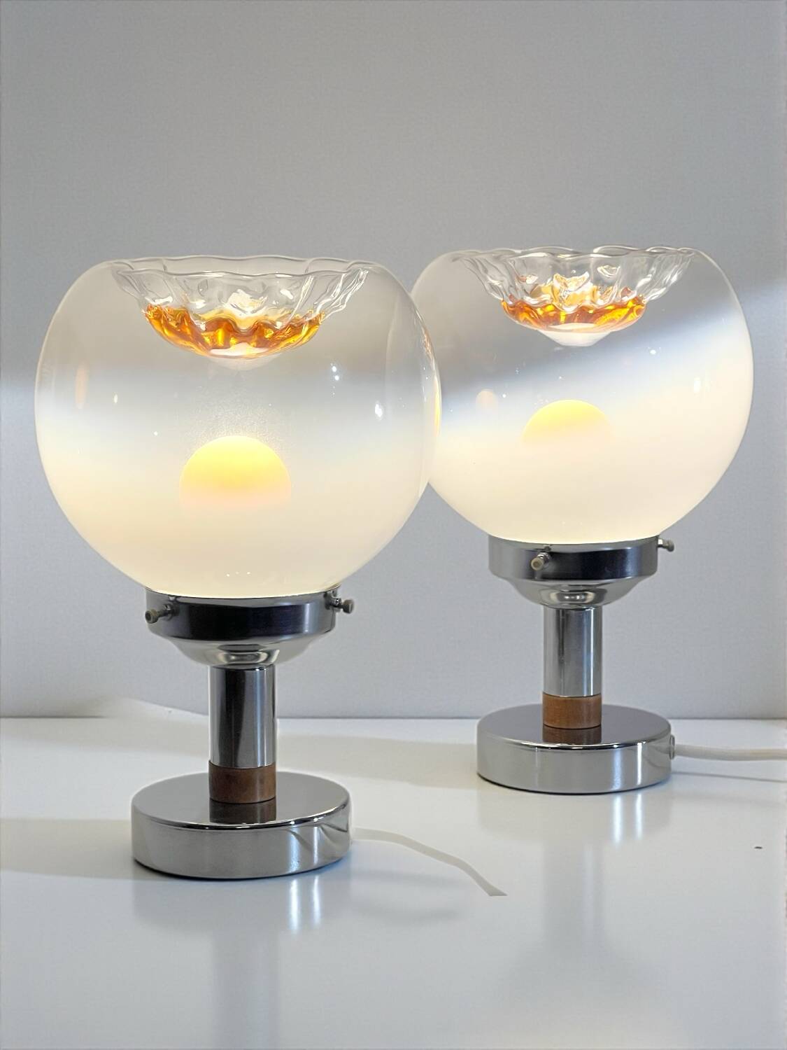 Pair of table lamps with large Murano globes from the 70s.