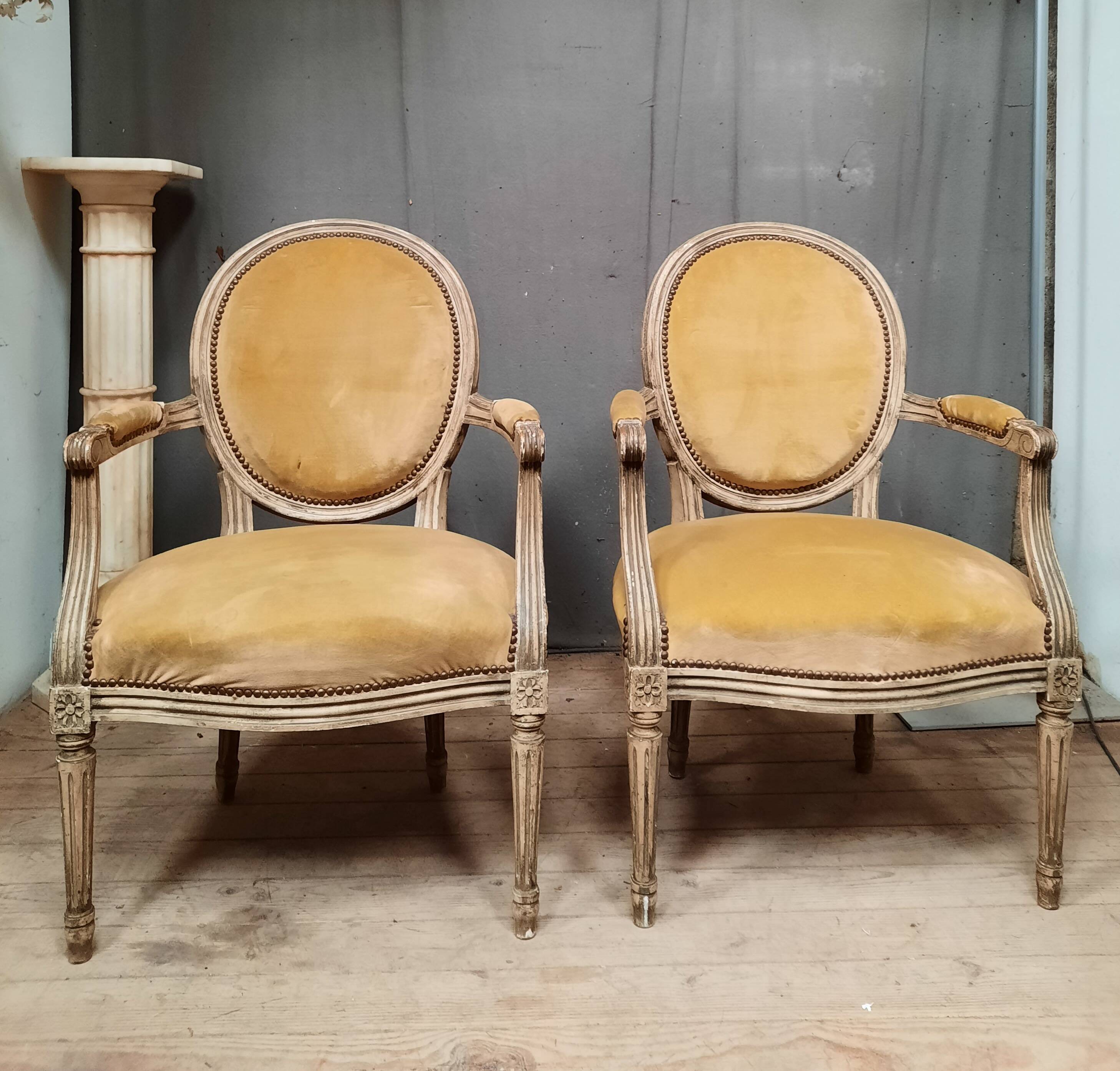 Pair of Louis XVI style medallion armchairs