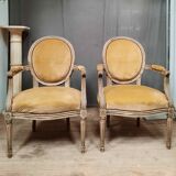 Pair of Louis XVI style medallion armchairs