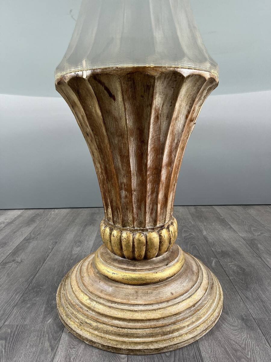 Table with a central carved wooden base, 20th century