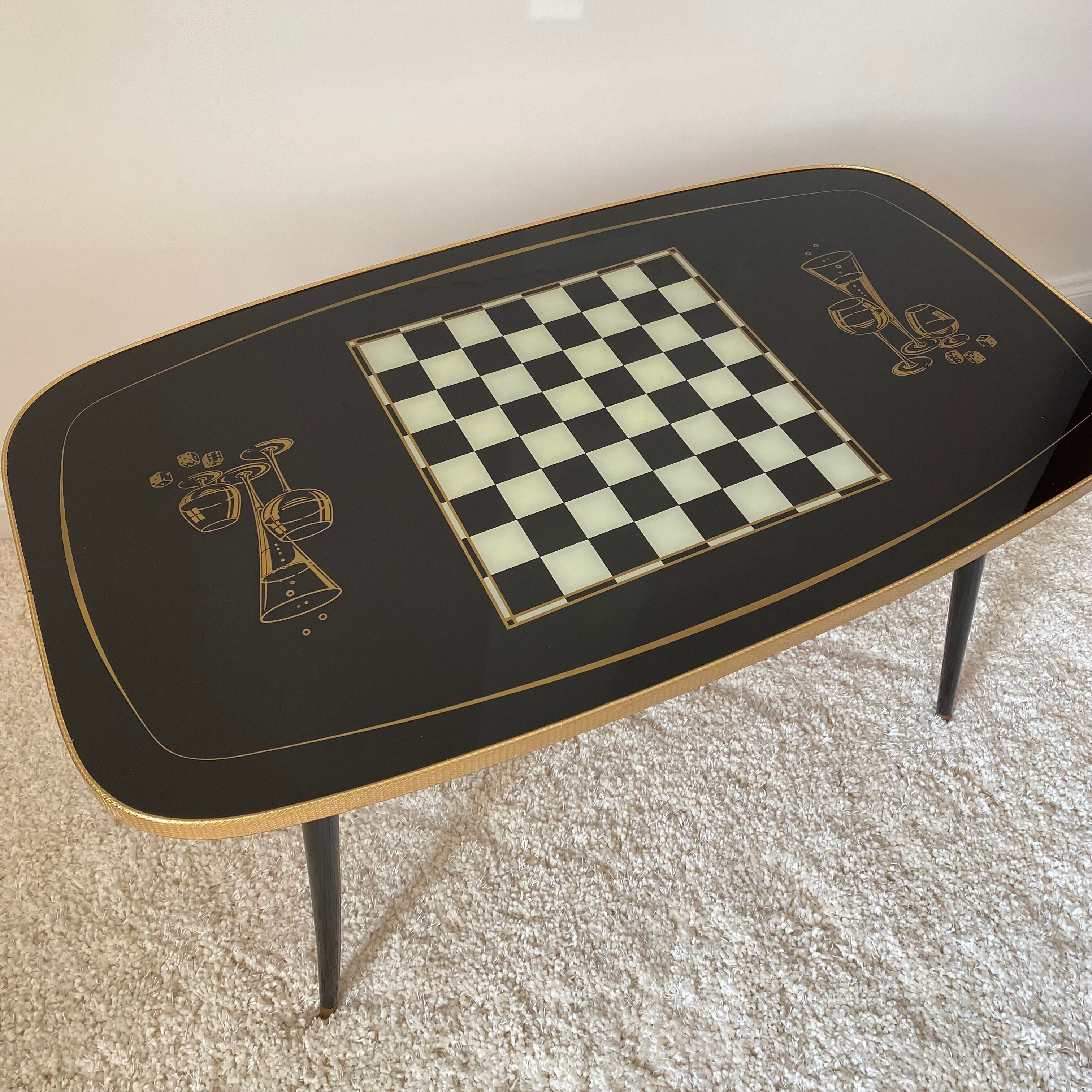 Rectangular vintage coffee table in black and gold glass